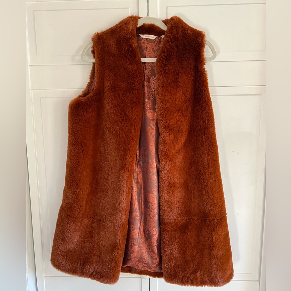 Burnt orange fur vest. Super soft, size S. Never been worn